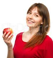 Young happy girl with apple