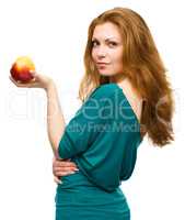 Young happy girl with apple