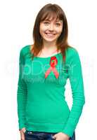 Woman with the red awareness ribbon