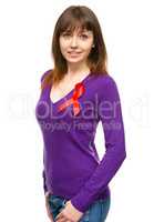 Woman with the red awareness ribbon