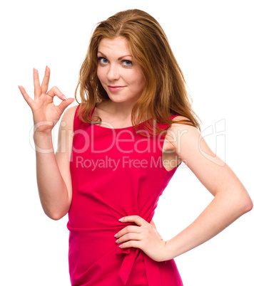 Woman is showing OK sign