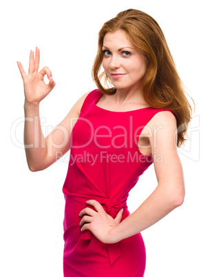 Woman is showing OK sign