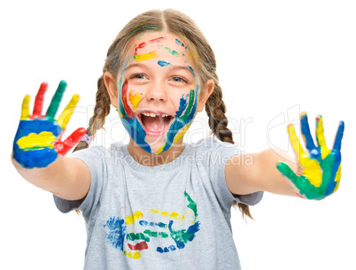 Portrait of a cute girl playing with paints Portrait of a cute girl playing with paints