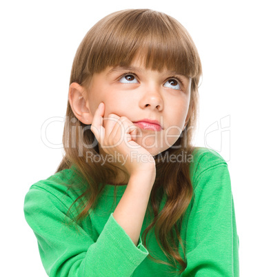 Young girl is daydreaming