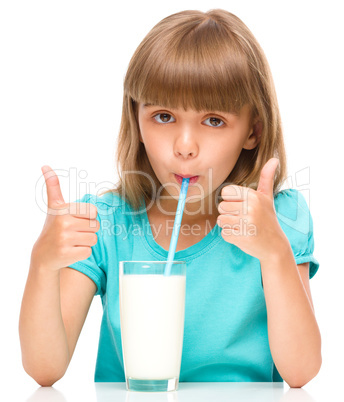 Cute little girl with a glass of milk