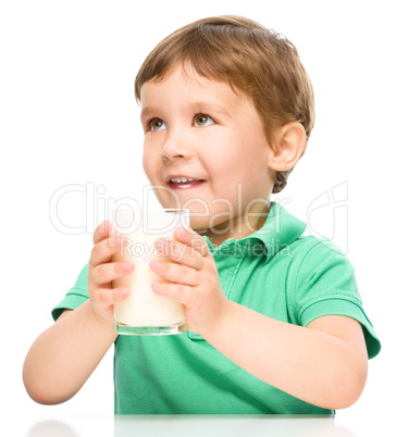 Cute little boy with a glass of milk Cute little boy with a glass of milk
