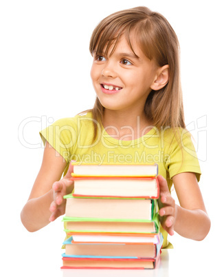 Little girl with her books
