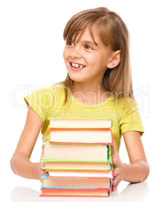 Little girl with her books