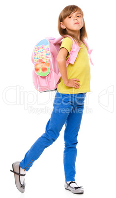 Portrait of a cute little schoolgirl with backpack