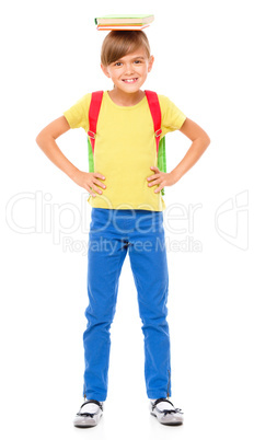 Portrait of a cute little schoolgirl with backpack