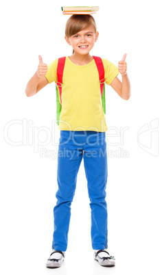 Portrait of a cute little schoolgirl with backpack