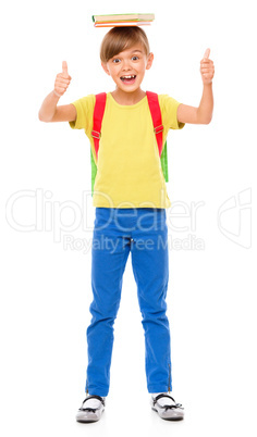 Portrait of a cute little schoolgirl with backpack