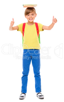 Portrait of a cute little schoolgirl with backpack