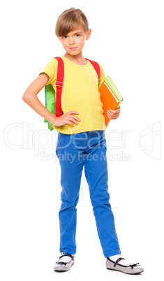 Portrait of a cute little schoolgirl with backpack