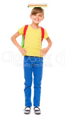 Portrait of a cute little schoolgirl with backpack