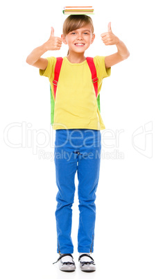 Portrait of a cute little schoolgirl with backpack