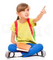 Little girl with her books