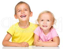 Portrait of a cute little girl and boy