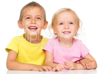 Portrait of a cute little girl and boy