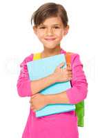 Young girl is holding book