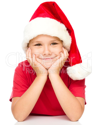 Portrait of a cute little girl in santa hat