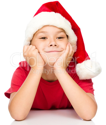 Portrait of a cute little girl in santa hat