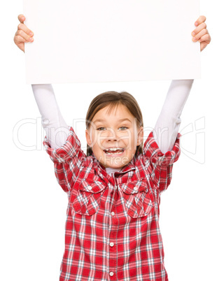 Little girl is holding a blank banner