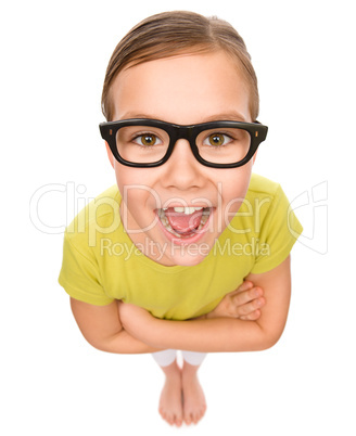 Portrait of a happy little girl wearing glasses