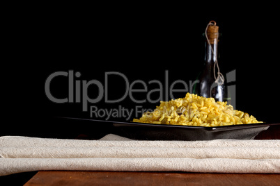 Risotto with Saffron on wooden table