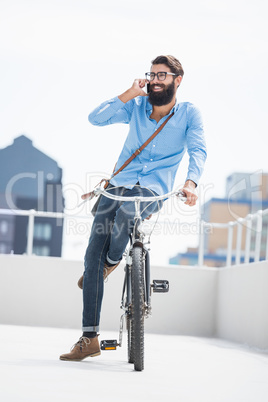 Hipster calling someone