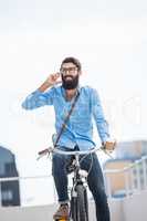 Hipster calling someone