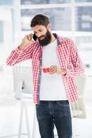 Hipster man is calling someone