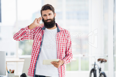 Hipster man calling someone