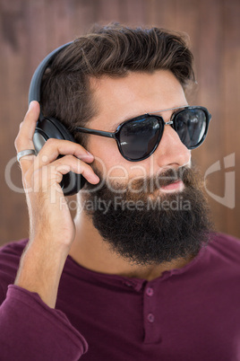 Hipster man listening music