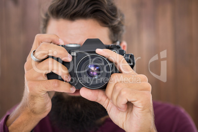 Hipster man taking picture