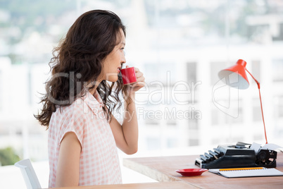 Hipster woman drinking a coffee