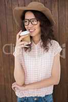 Hipster woman drinking a coffee