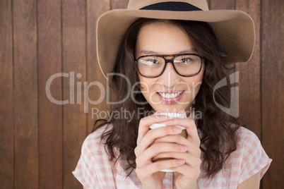 Hipster woman drinking a coffee