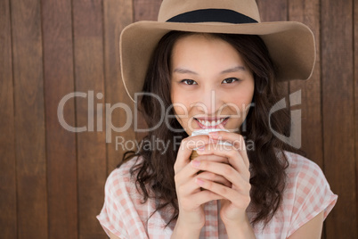 Hipster woman drinking a coffee