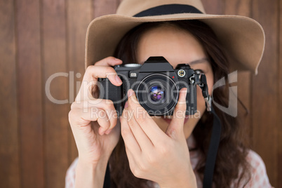 Hipster woman taking a picture