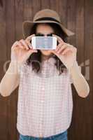 Hipster woman taking a picture