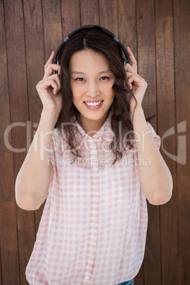 Hipster woman listening music