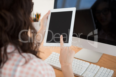 A business woman is using a touchpad
