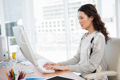 A businesswoman is typing