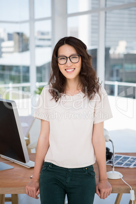 A business woman is standing