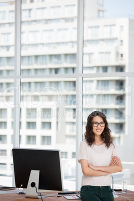 A business woman is standing