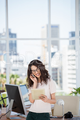 A businesswoman is having a phone call