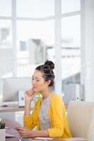 A businesswoman is reading documents