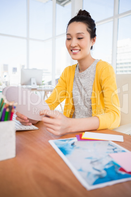 A businesswoman is reading documents