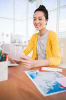 A businesswoman is reading documents